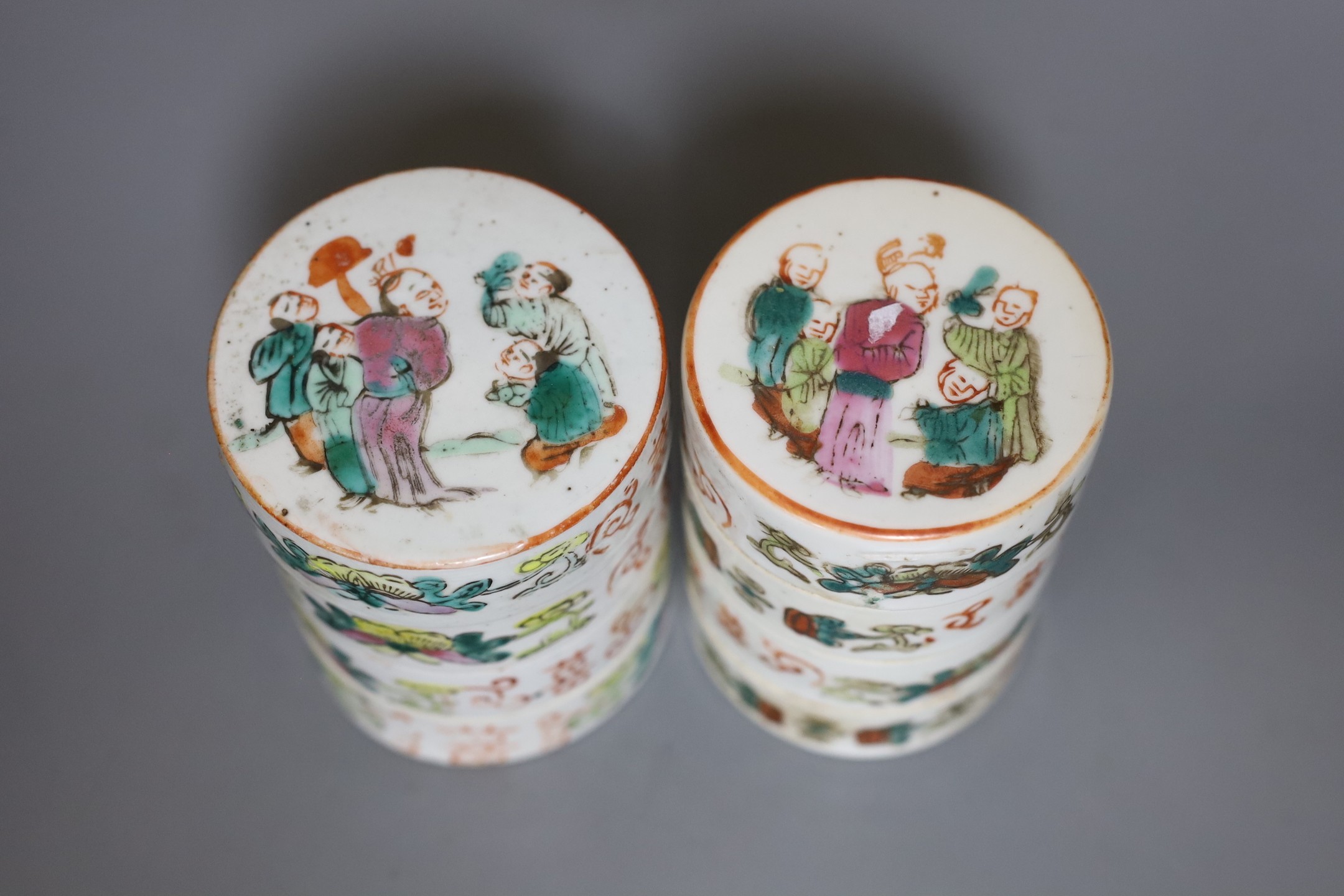 Two Chinese famille rose four tier, stacking boxes, early 20th century, 11cms high